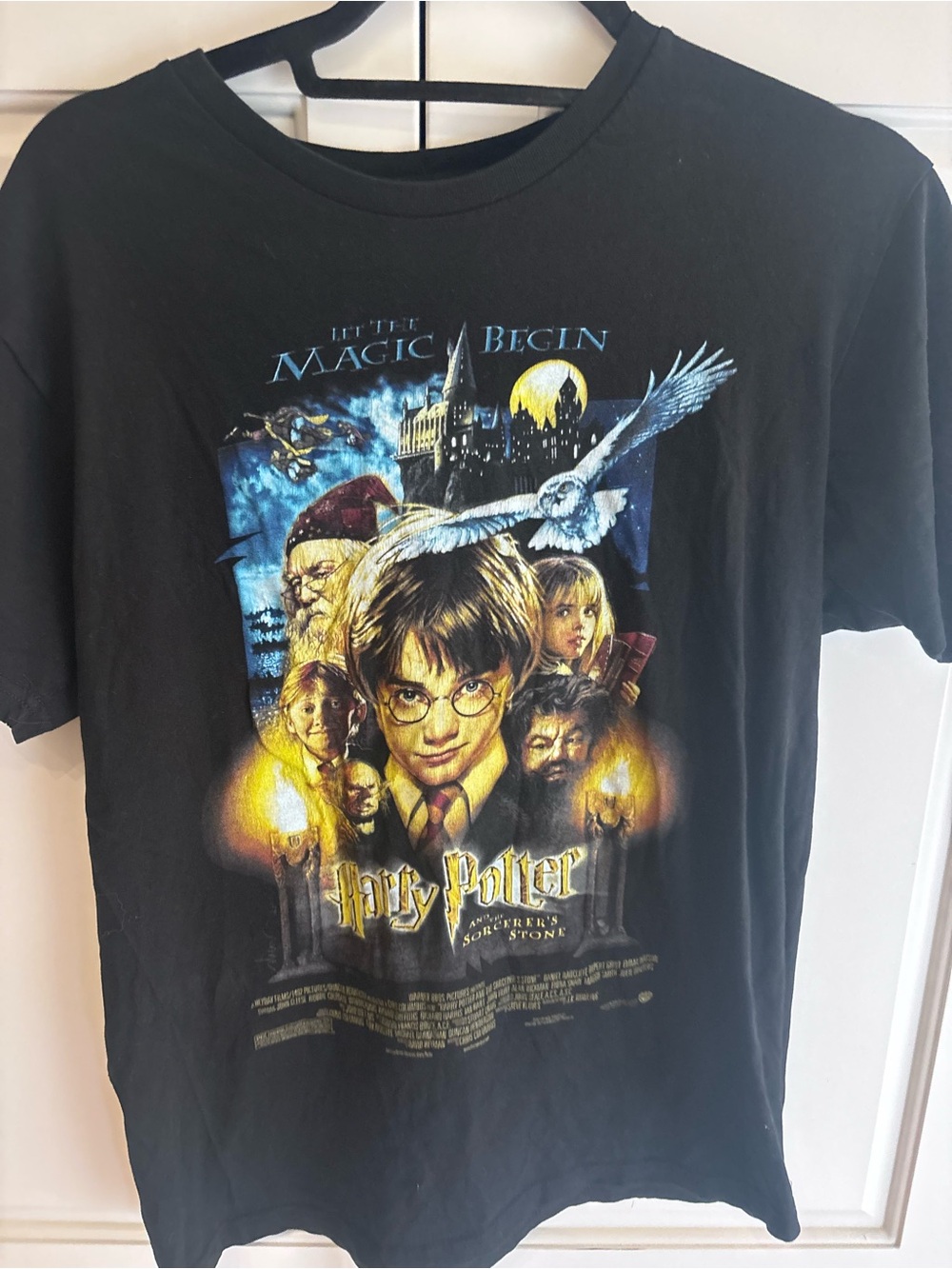 Harry Potter men’s medium Black Graphic Tee - Let the Magic Begin